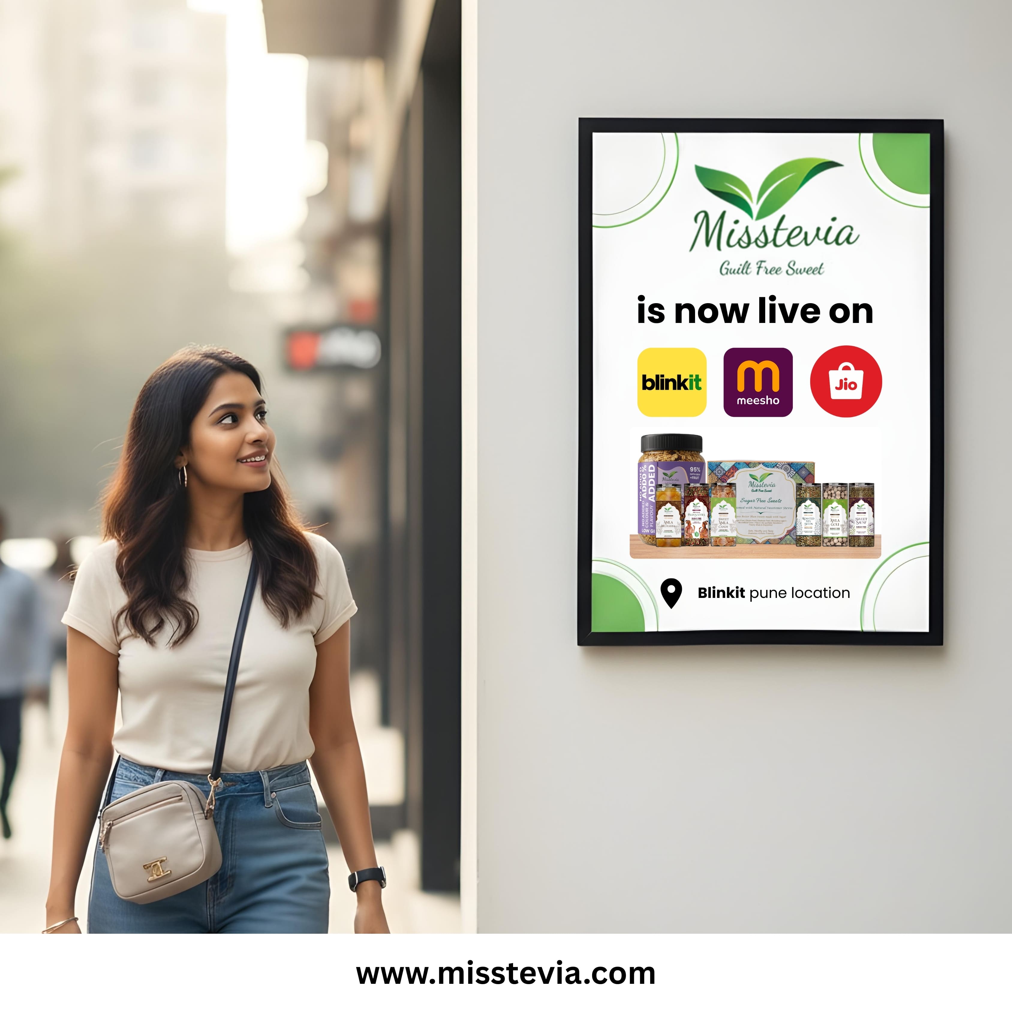 Woman walking past a Misstevia advertisement on a wall
